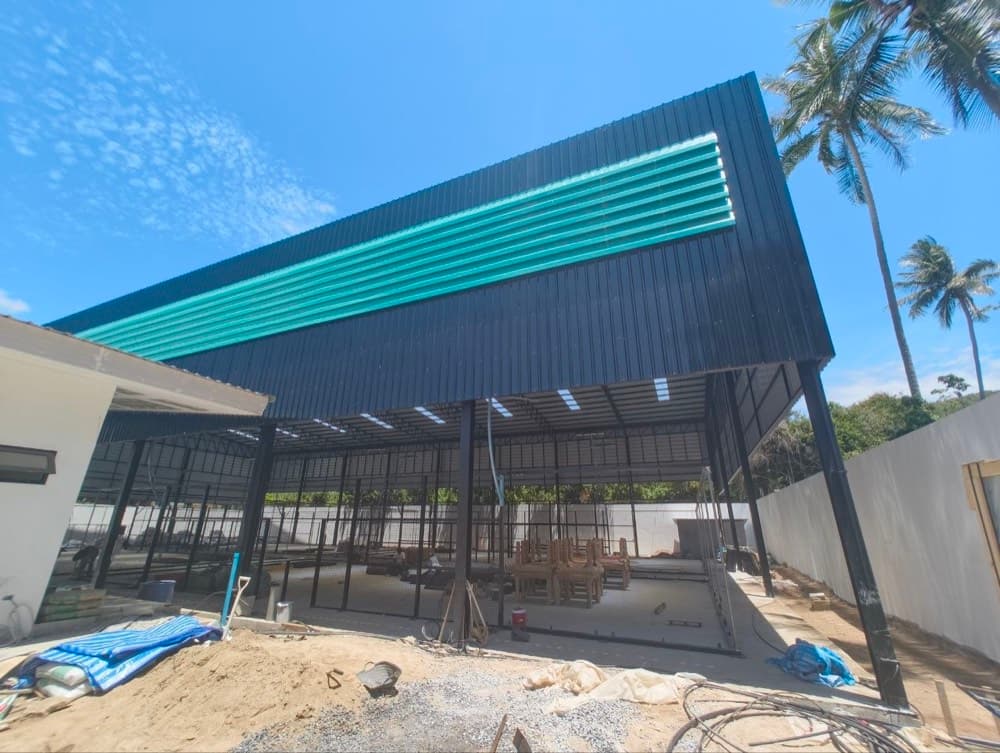 Covered hall exterior in brand colours